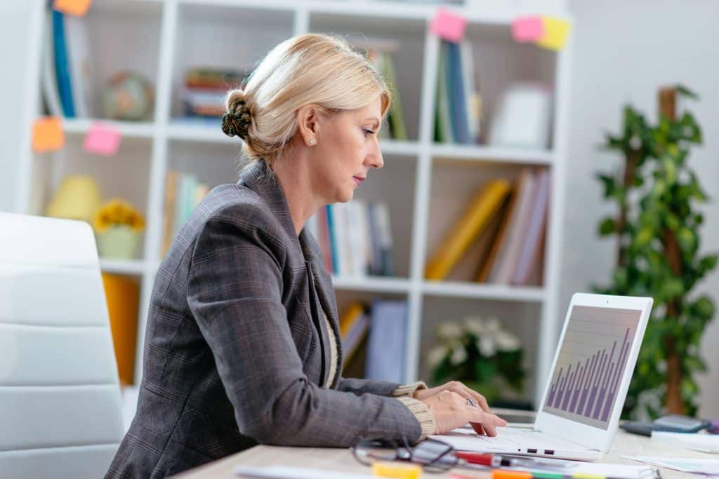 Businesswoman working on laptop