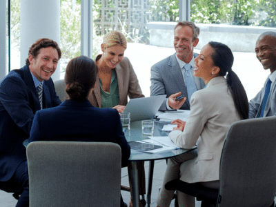 Group of professionals chatting in a meeting