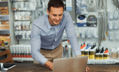 Man checking his tax credits on a laptop at work