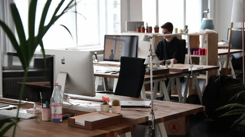 A professional office setup with a desk and computer.