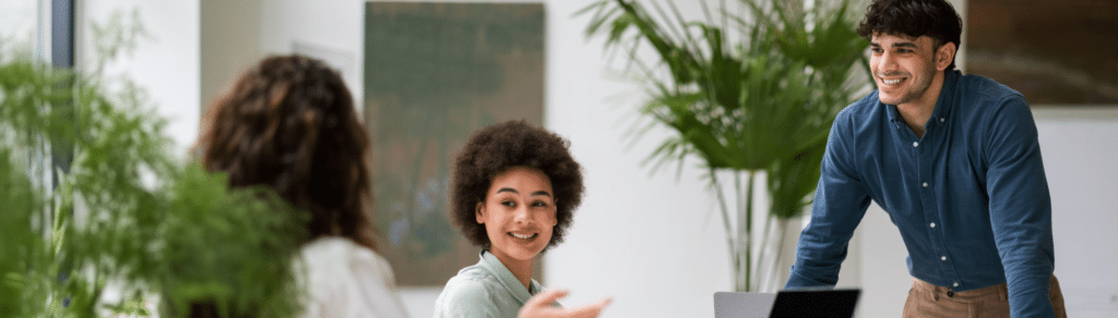 a woman with curly hair smiling