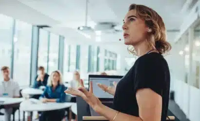 woman standing in a corporate office