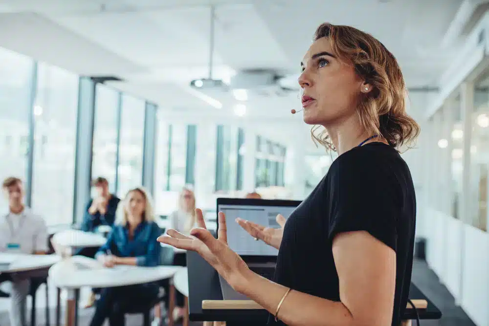 woman standing in a corporate office